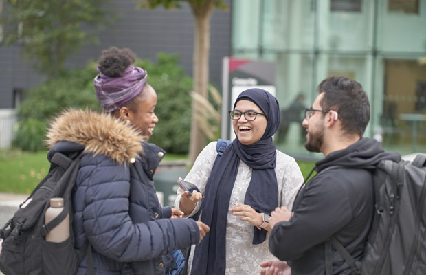 student on campus chatting