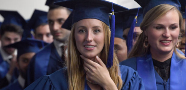 people in graduation gowns and hats