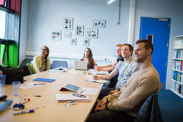 LJMU people at desk