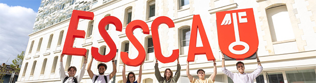 International Students hold up a sign for ESSCA 
