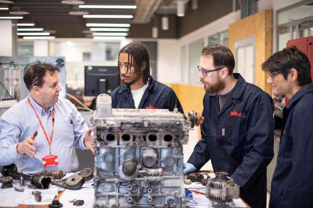 University of Bedfordshire - Students working on an engine