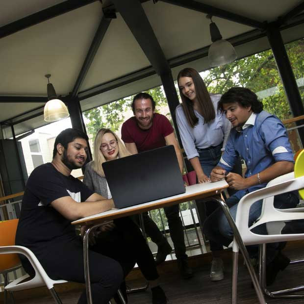 ARU image - students sat around table